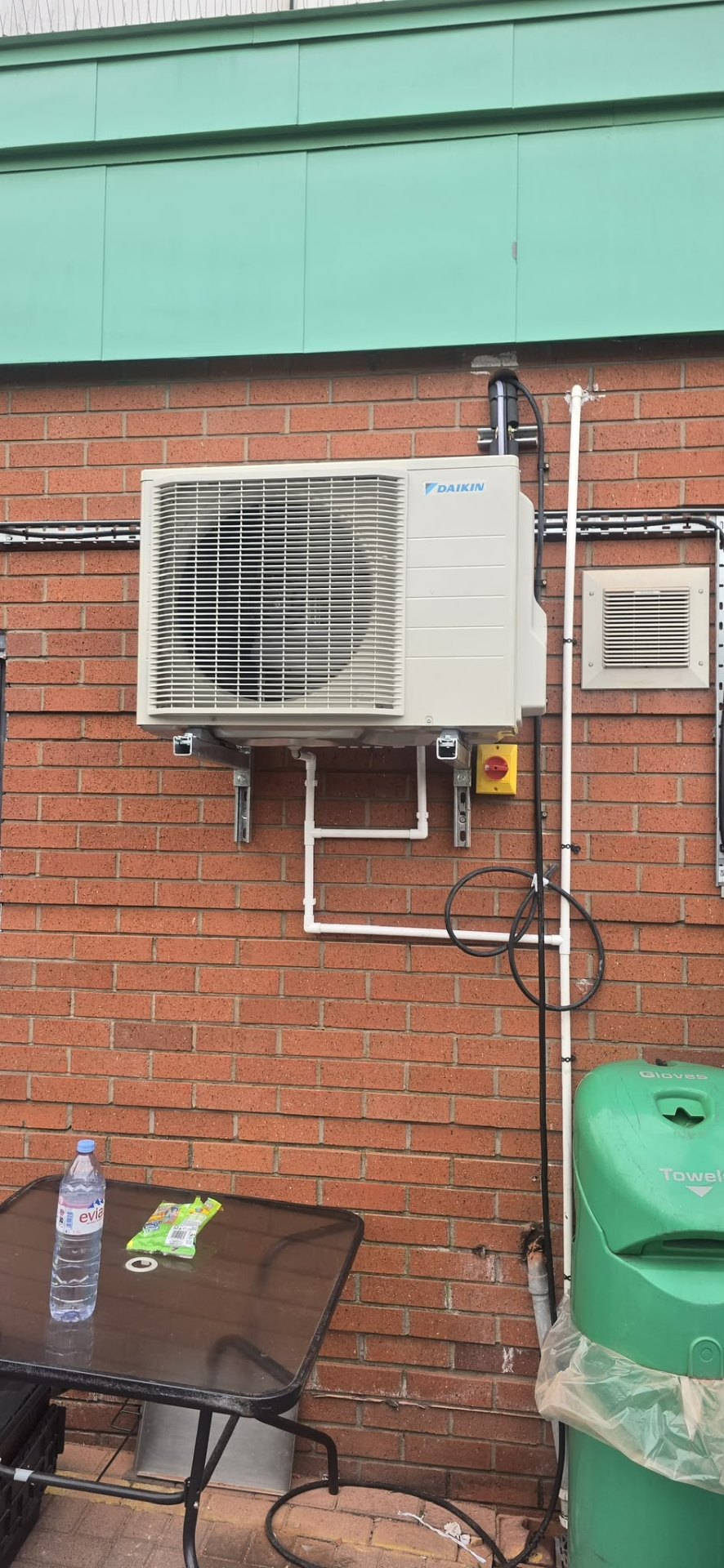 Air conditioning indoor cassette unit installed in a North West office ceiling.
