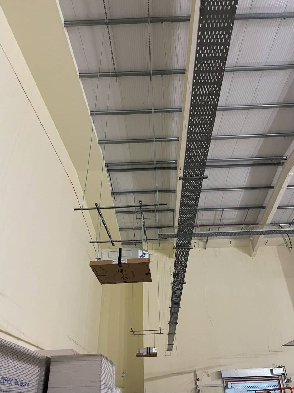 High-level ductwork and ventilation install in a North West commercial building.