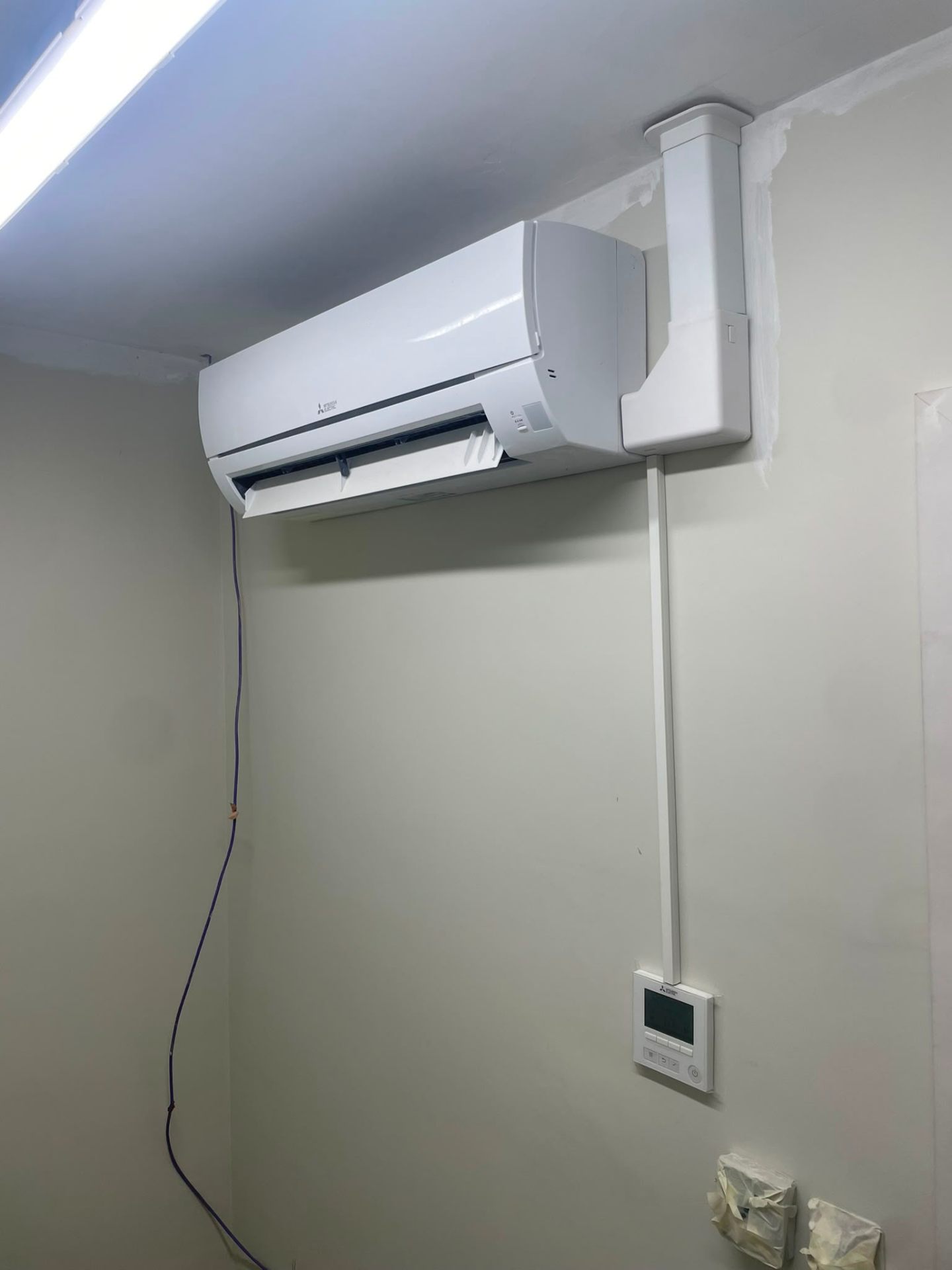 Mitsubishi Electric split air conditioning system fitted in a North West commercial interior by F-Gas registered engineers.