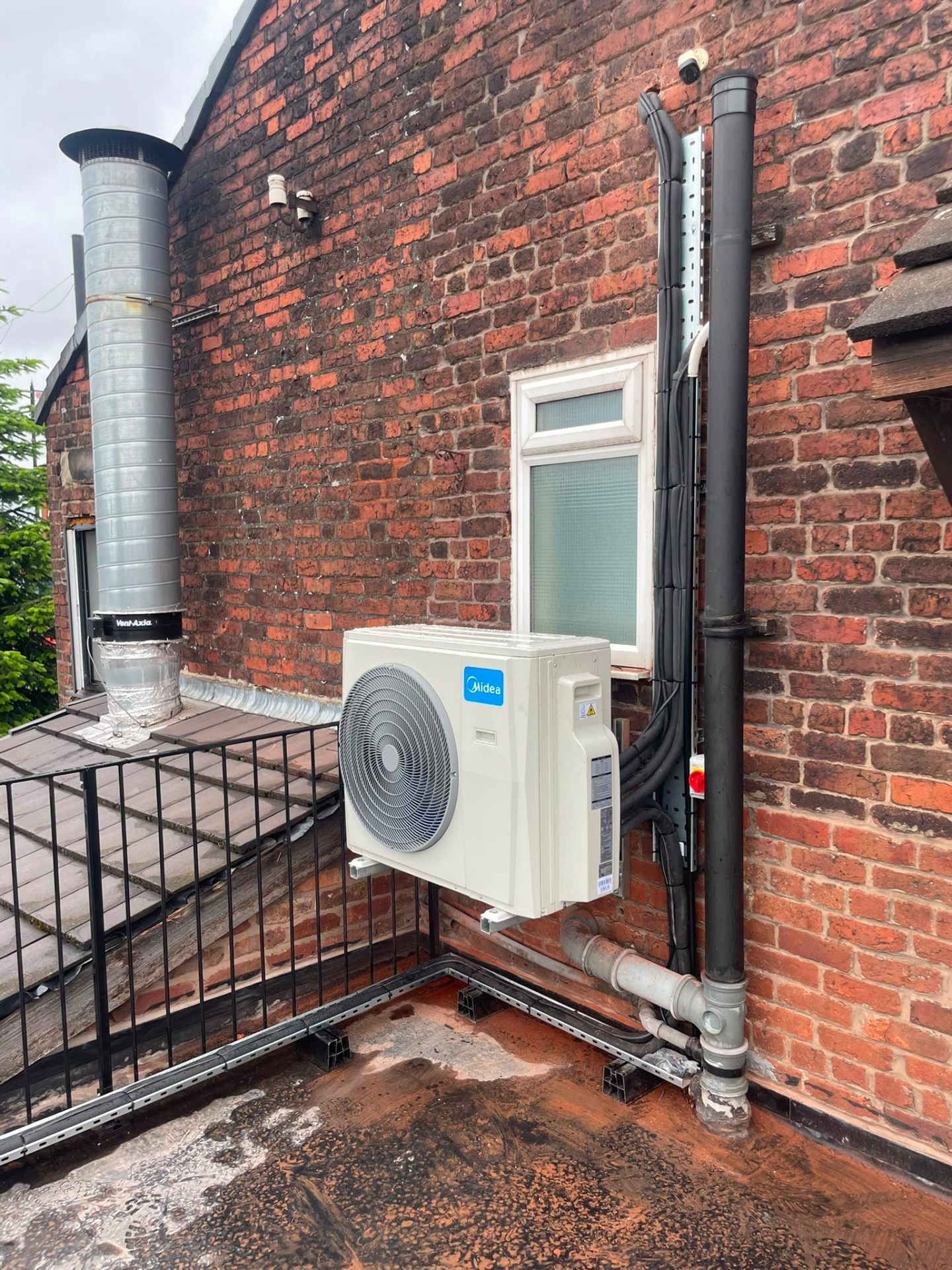 Discreet ducted air conditioning grille installed in a North West restaurant ceiling.