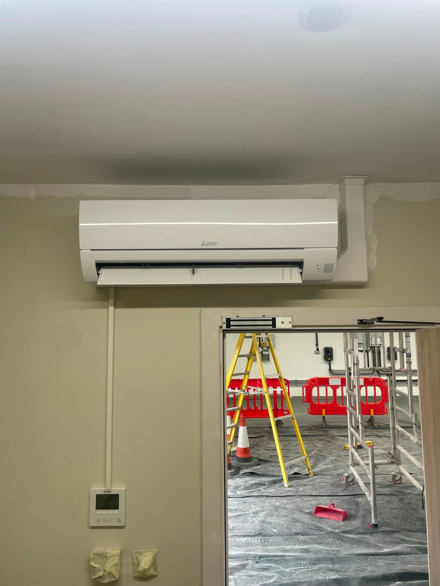 Commercial Daikin outdoor condenser cage installed for a North West restaurant cooling system.